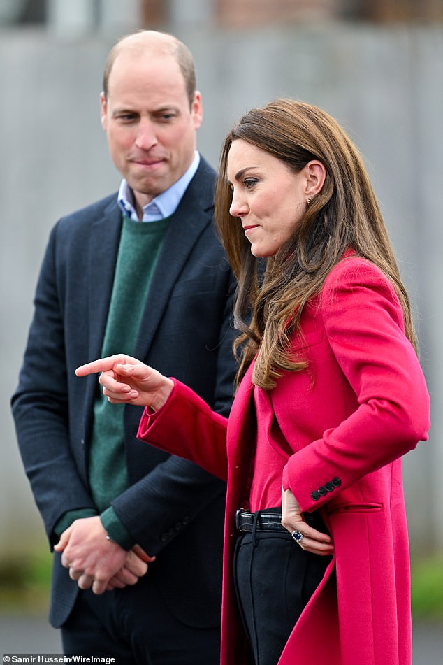 Prince William watches over Kate at the Windsor Foodshare in January 2023