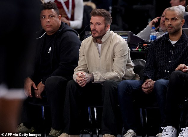 The pair sat next to former Brazilian footballer Ronaldo as they enjoyed the match