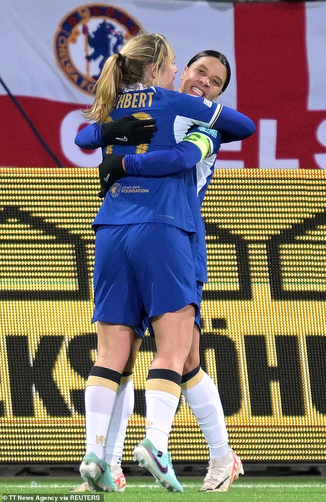 Kerr (pictured celebrating a Champions League goal with teammate Erin Cuthbert) has scored an impressive 98 goals in 128 appearances for Chelsea