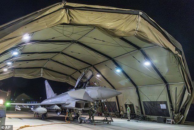 An RAF Typhoon aircraft returns to base at RAF Akrotiri in Cyprus after striking targets in Yemen on Friday