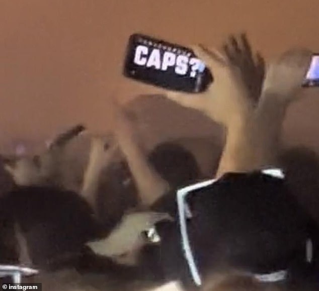 Video footage from the festival posted on social media showed a person holding up a cell phone with the word 