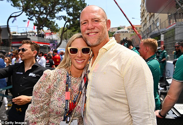 Mike and Zara pose for a photo on the grid during the F1 Monaco Grand Prix