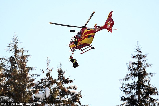 A medical helicopter transports Alexis Pinturault to a local hospital in Switzerland