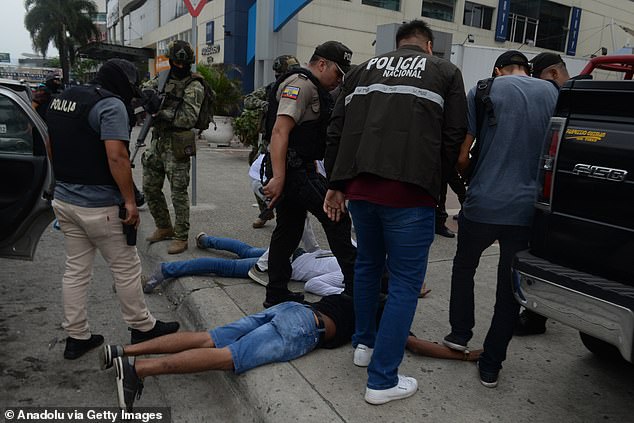 Ecuadorian police arrest several armed men who broke into the set of a public television channel