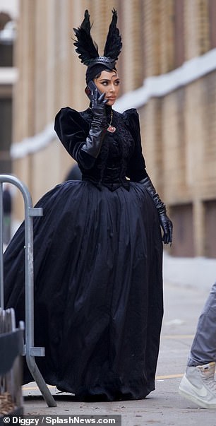 Her character was costumed in a black antebellum-era crinoline and a black velvet top with corset, turtleneck and square shoulders.