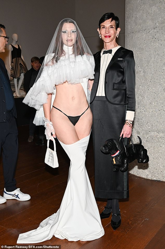 Her latest effort responds to her personal challenge.  The Uncut Gems actress, 33, wore a barely-there look that appeared to be inspired by a wedding dress