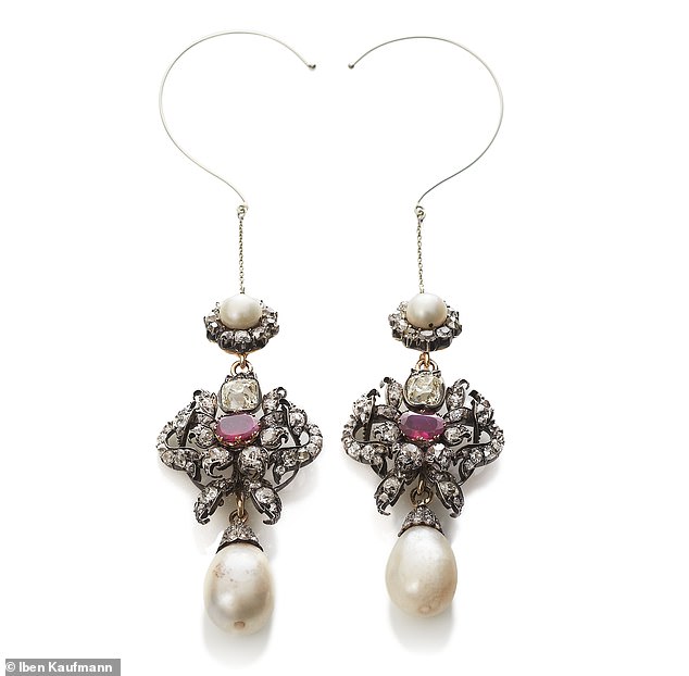 The huge pearl, ruby ​​and diamond earrings from the set