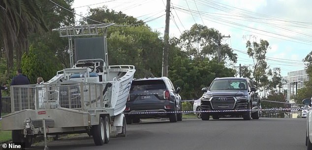 Officers establish a crime scene in the area (pictured) as police continue to investigate the circumstances surrounding the girl's death