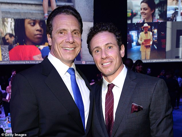 Cuomo, right, was fired by CNN in December 2021 after it emerged he had secretly helped his brother Andrew, left, with a strategy to counter harassment allegations