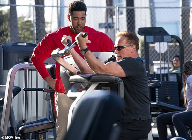 At one point, while the cameras were rolling, Miles could be seen talking about the seven-time Mr.  Olympia champion standing around and watching him do biceps exercises.