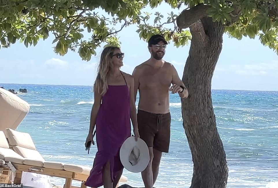 Lovers or not, Josh and Christine seemed happy together during their trip to Hawaii's Big Island in July