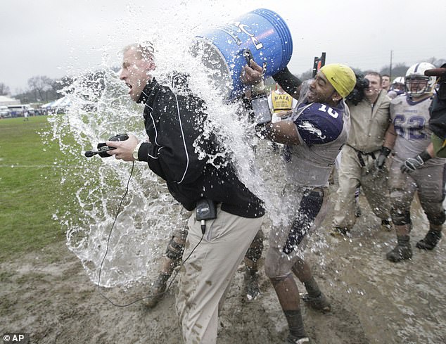 Then-Sioux Falls head coach Kalen DeBoer celebrates a national title win with players in 2008