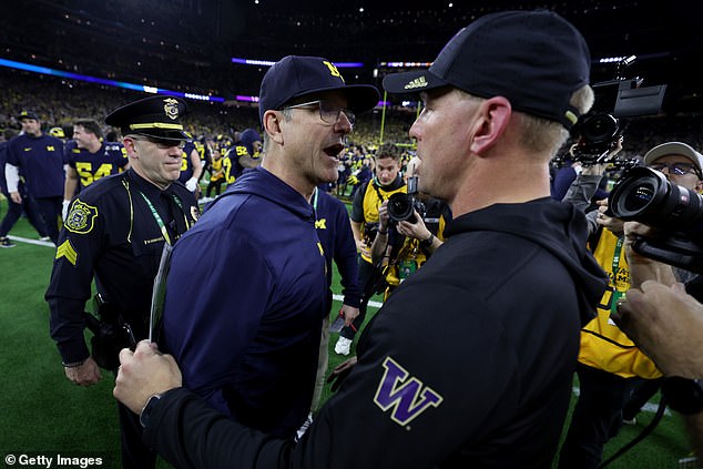 Michigan Wolverines head coach Jim Harbaugh shakes hands after the title game