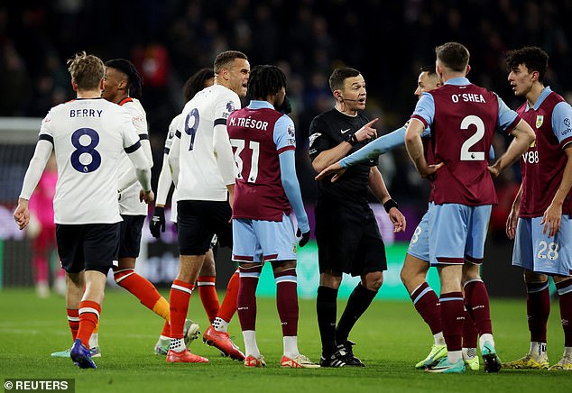 Burnley's players protested against the decision which denied them the crucial three points at Turf Moor