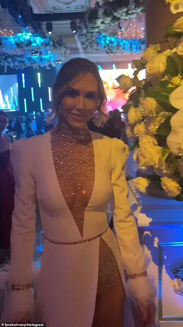 She wore a white Oscar G Couture dress with a plunging neckline and a sparkling nude turtleneck bodysuit to a New Year's Eve party at Donald Trump's Mar-a-Lago club in Palm Beach, Florida