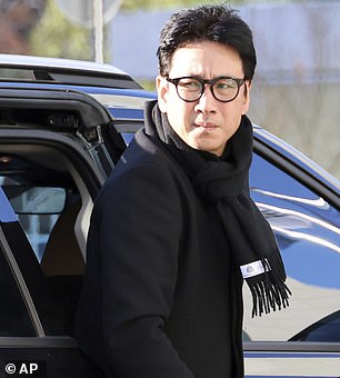 Lee is pictured on December 23 arriving at the Incheon Metropolitan Police station in South Korea for questioning over his drug use