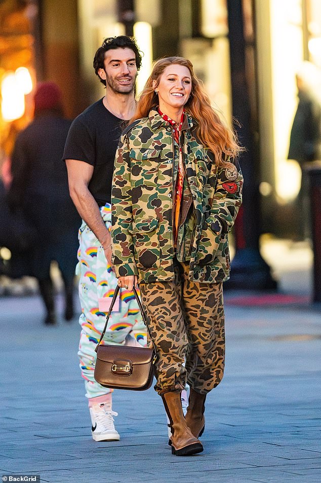 The 36-year-old actress was dressed from head to toe in camouflage and had fiery red hair as they filmed the romantic scene while on set in New Jersey.