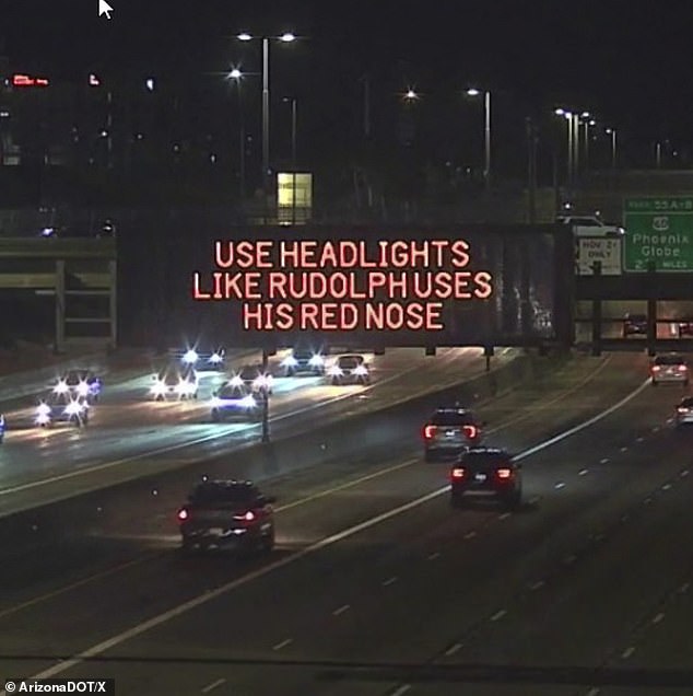 This sign from the Arizona DOT reminds drivers to use their lights while conveying holiday cheer