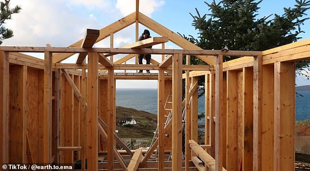 This image shows Frazer working on what is now Cuillin View Cabin (above)