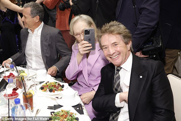 Later, Meryl and the Canadian actor also sat next to each other at the table in the glitzy award show - as they were all smiles