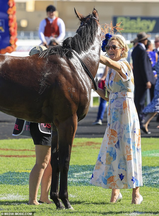 At one point, Zara Tindall, 42, walked onto the racecourse to pet one of the competing horses