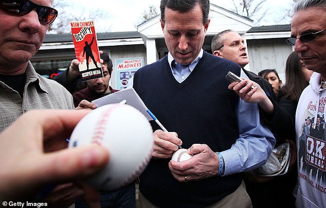 Santorum signing autographs in 2012