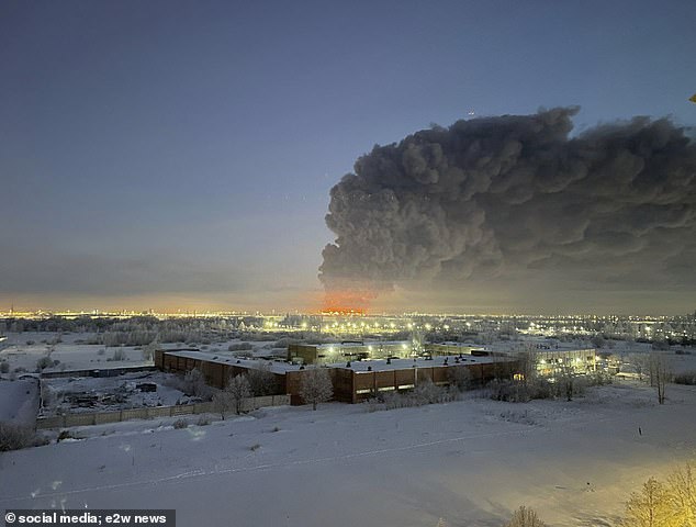 A thick cloud of smoke can be seen above the St. Petersburg skyline