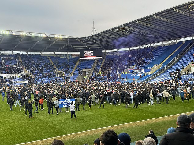 Supporters invaded the pitch in the 16th minute to protest the club's ownership