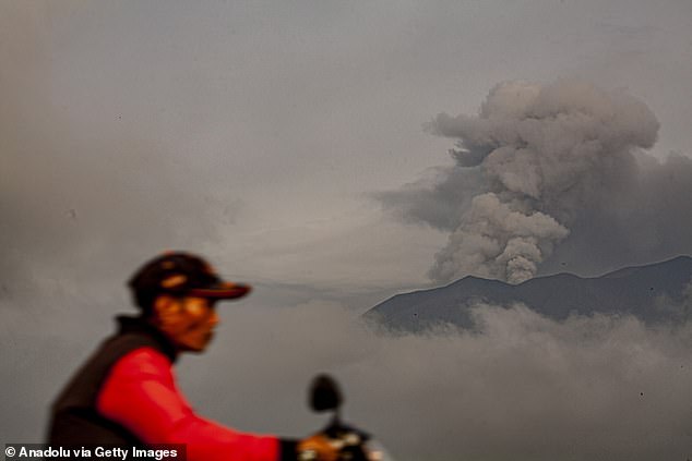 Mount Marapi spews columns of volcanic ash during an eruption, seen from Tanah Datar District, West Sumatra, Indonesia on January 13, 2024