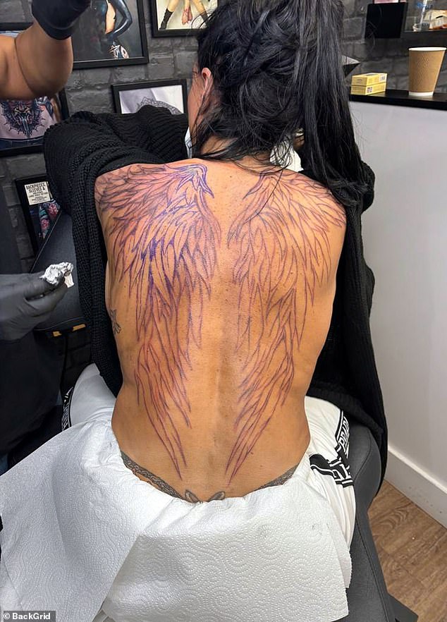 Her back tattoo appears to be the largest she has undergone