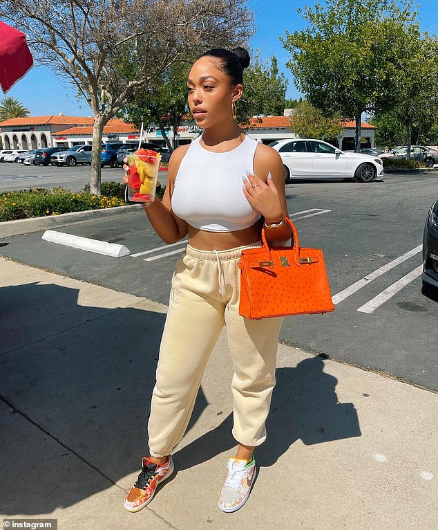 An ostrich Birkin like the one seen here on Jordyn Woods can fetch $40,000 on the resale market, depending on size, color, hardware and condition