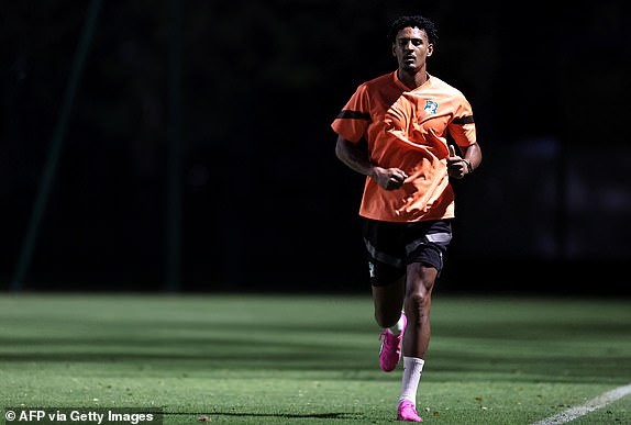 Ivory Coast's striker No. 22, Sebastien Romain Teddy Haller, attends a training session at Abidjan's Technical Highscool Stadium, on January 12, 2024, on the eve of the 2024 Africa Cup of Nations (CAN) football match between Ivory Coast and Guinea- Bissau.  (Photo by FRANCK FIFE/AFP) (Photo by FRANCK FIFE/AFP via Getty Images)