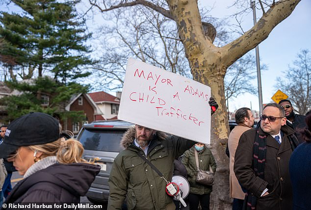 Many parents, grandparents and local politicians protest outside the school