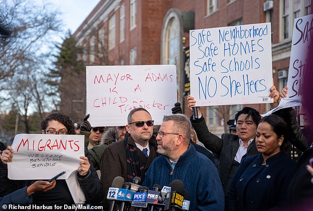 Locals in Brooklyn gathered outside James Madison High School today