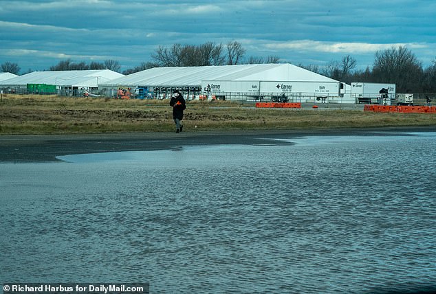 Officials feared Floyd Bennett Field would flood and sent the migrants to the school to sleep