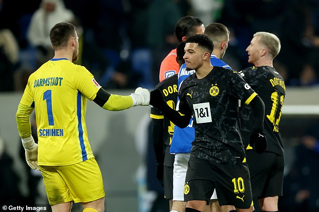 Sancho celebrated with his Dortmund teammates after their dominant win over Darmstadt