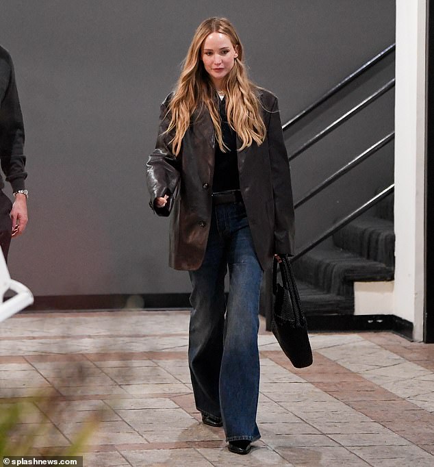 The New York-based couple - enjoying a visit to Los Angeles this week - appeared to meet Emma Stone (not pictured) for dinner