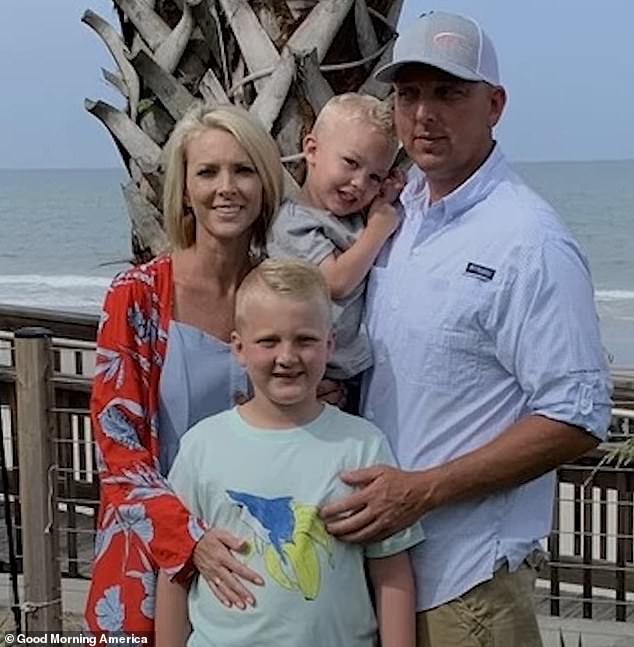 Cindy, her husband DJ, and their two young sons before the blood poisoning that nearly took her life