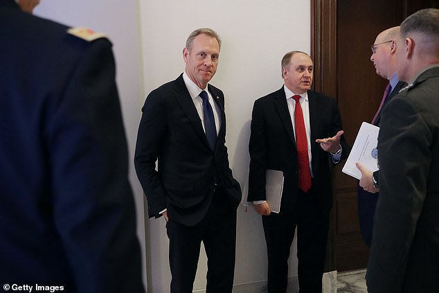 Spirit CEO Patrick Shanahan (C) previously worked at Boeing for 31 years and served as acting Secretary of Defense in the Trump administration