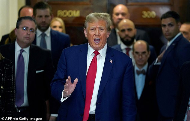 Former President Donald Trump speaks to reporters Thursday after leaving the New York State Supreme Court as part of his civil lawsuit over his business practices.  He returns to Iowa this weekend to campaign in the Hawkeye State ahead of Monday's caucuses