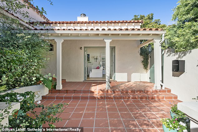 The Academy Award winner chose to retain the original architectural features of a tiled courtyard