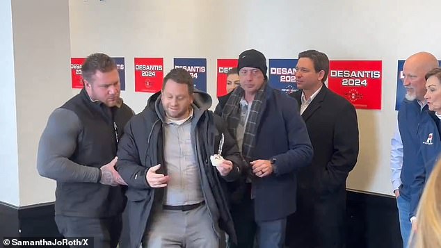 Members of DeSantis' security team escorted Stiefler as he attempted to present the trophy to DeSantis