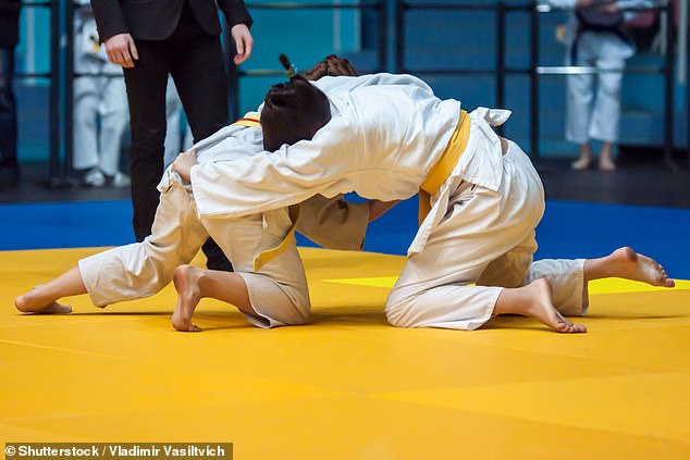 A world medalist in judo said she quit overnight after watching the 6ft tall biological male break a woman's finger