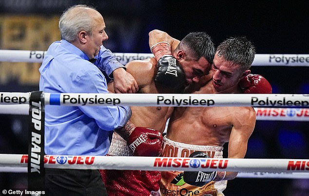 Fight fans stood and applauded the riveting match after it was over