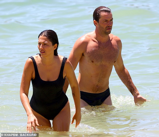 At one point, Jessica and Thomas cooled off by jumping into the ocean and seemed to be having the time of their lives as they paddled in the water together.