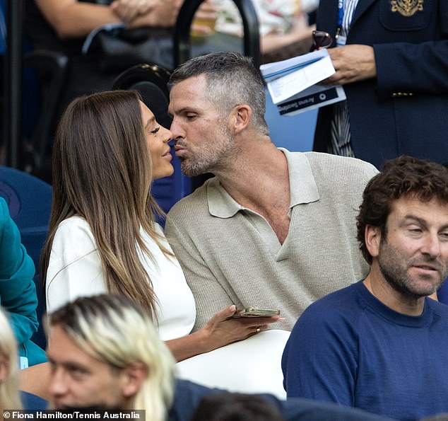 The couple watched the match between Novak Djokovic and Dino Prizmic, but only had eyes for each other