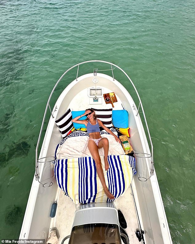 In a series of photos shared to Instagram, the daughter of AFL legend Brendan Fevola stretched out on the ship as she caught some sun