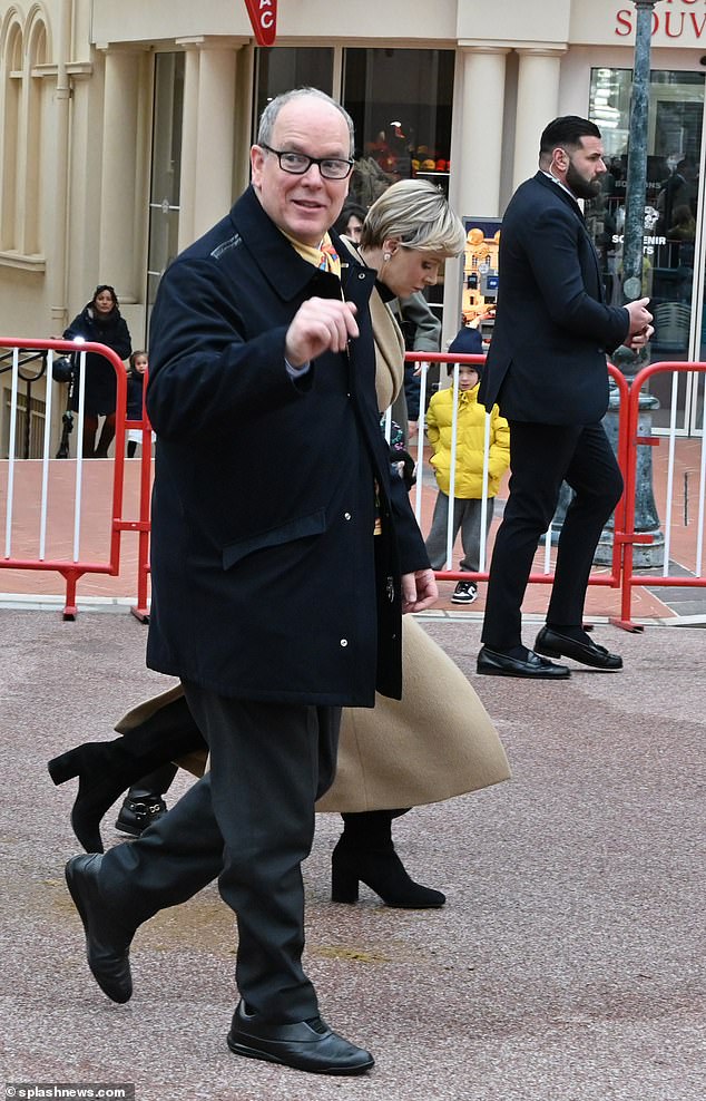 Prince Albert appeared cheerful as he greeted crowds on the streets of Monaco on Saturday