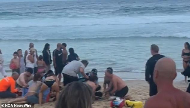 Within seconds, the swimmers were forced out to sea by the powerful current, stranding them in deep water (scene shown)