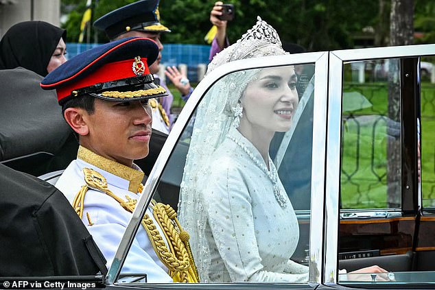 Photos show the couple taking part in a public wedding ceremony under a lush pergola before entering the palace for a formal blessing